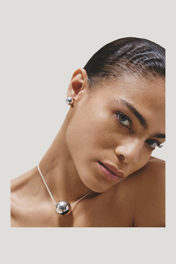 Sphere Earrings Silver — model side