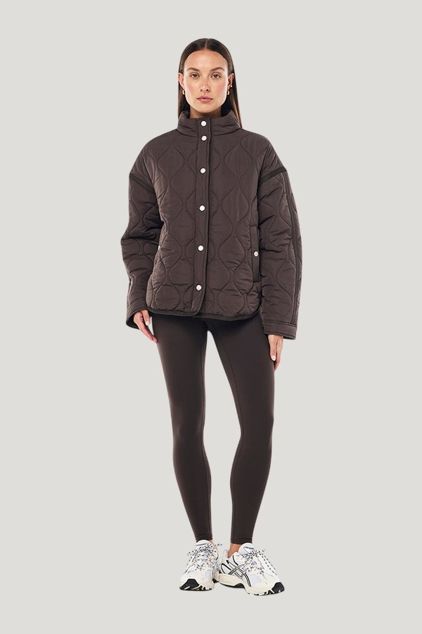 Surge Quilt Jacket In Coffee — model front