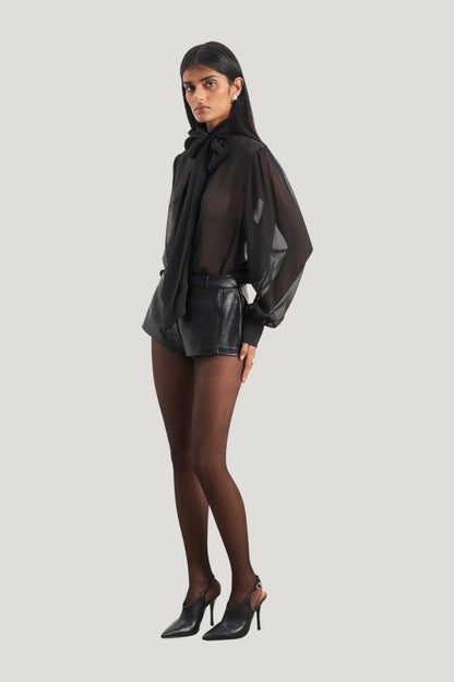 Tailored Leather Micro Shorts — model side