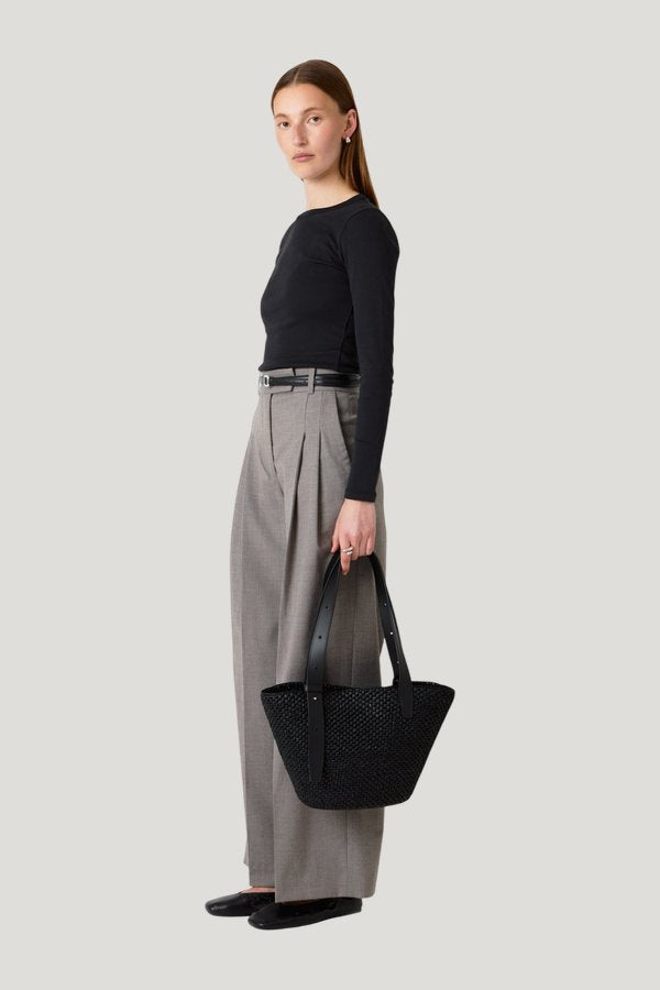 The Bianca Raffia Bag Small — model side