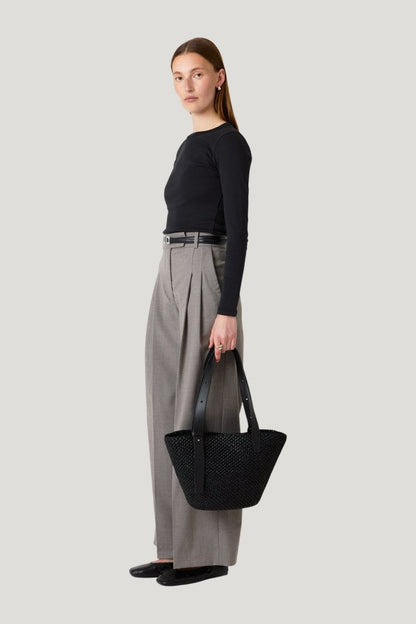 The Bianca Raffia Bag Small — model side