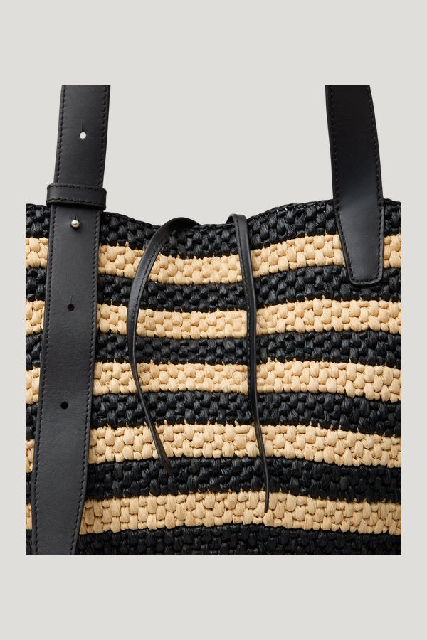 The Bianca Raffia Bag Small — model side