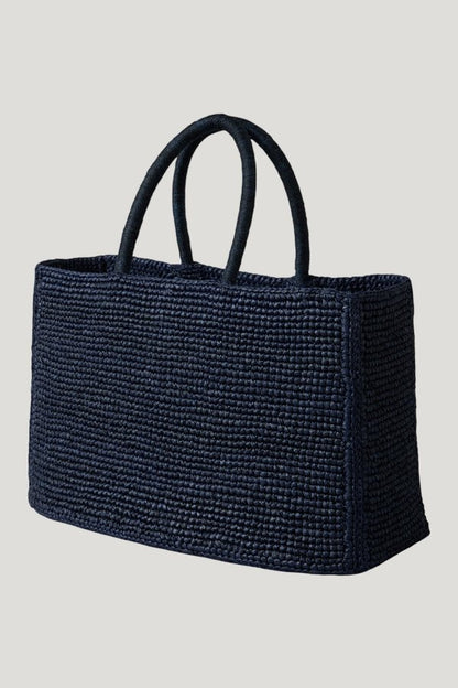 The Charlotte Raffia Bag Small — model front