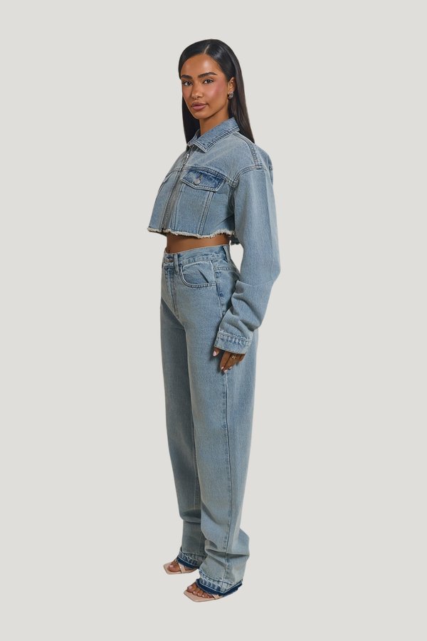 The Kali Mid-Rise Jeans in Light Wash — model side