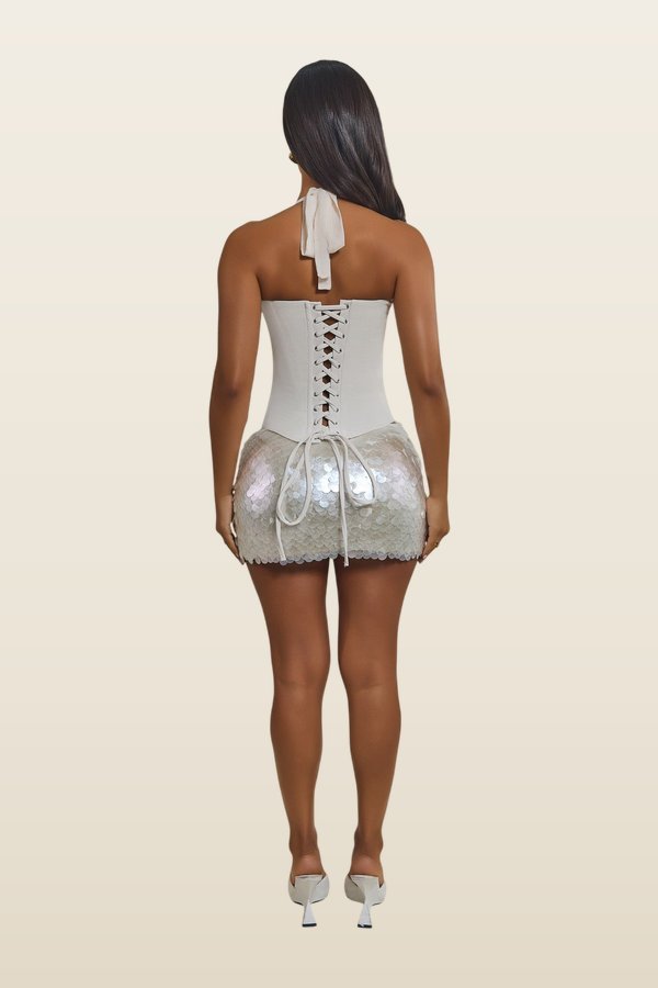 The Shimmi Sequin Micro Mini Skirt in Cream Pearl — model back