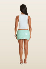 The Shimmi Mini Skirt — model back