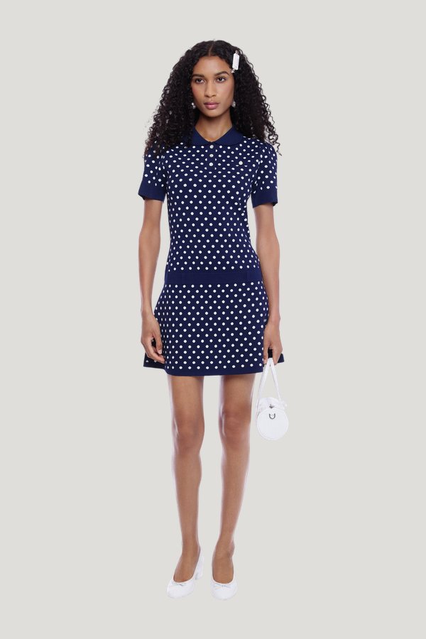 Tumi Sweater Dress In Navy White Polka Dot — model front
