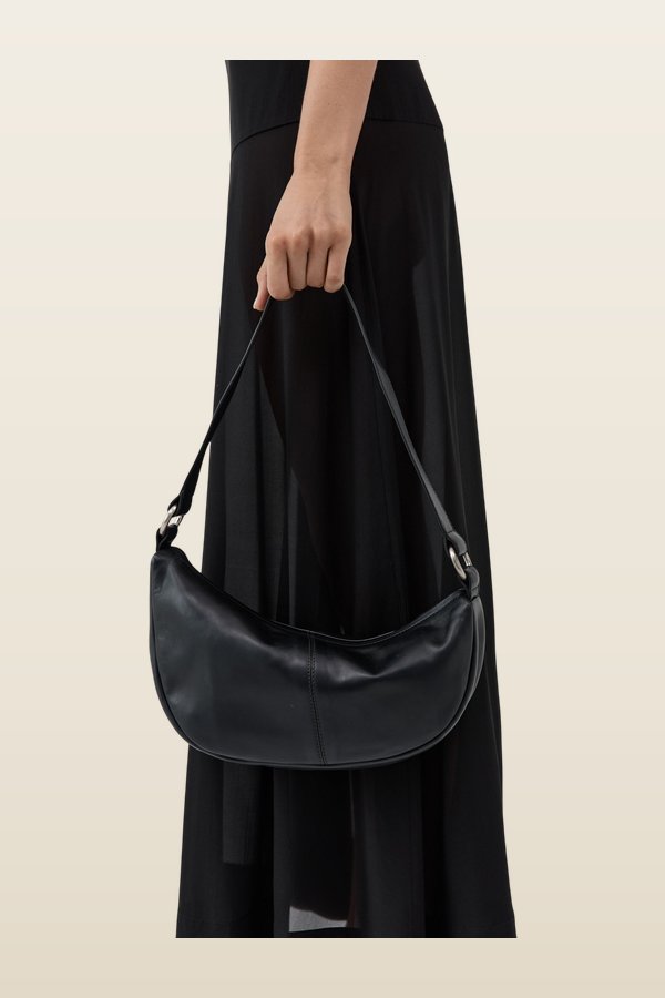 Utility Crescent Bag — model back